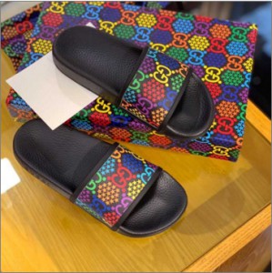 Gucci black mini GG Supreme canvas Unisex slippers